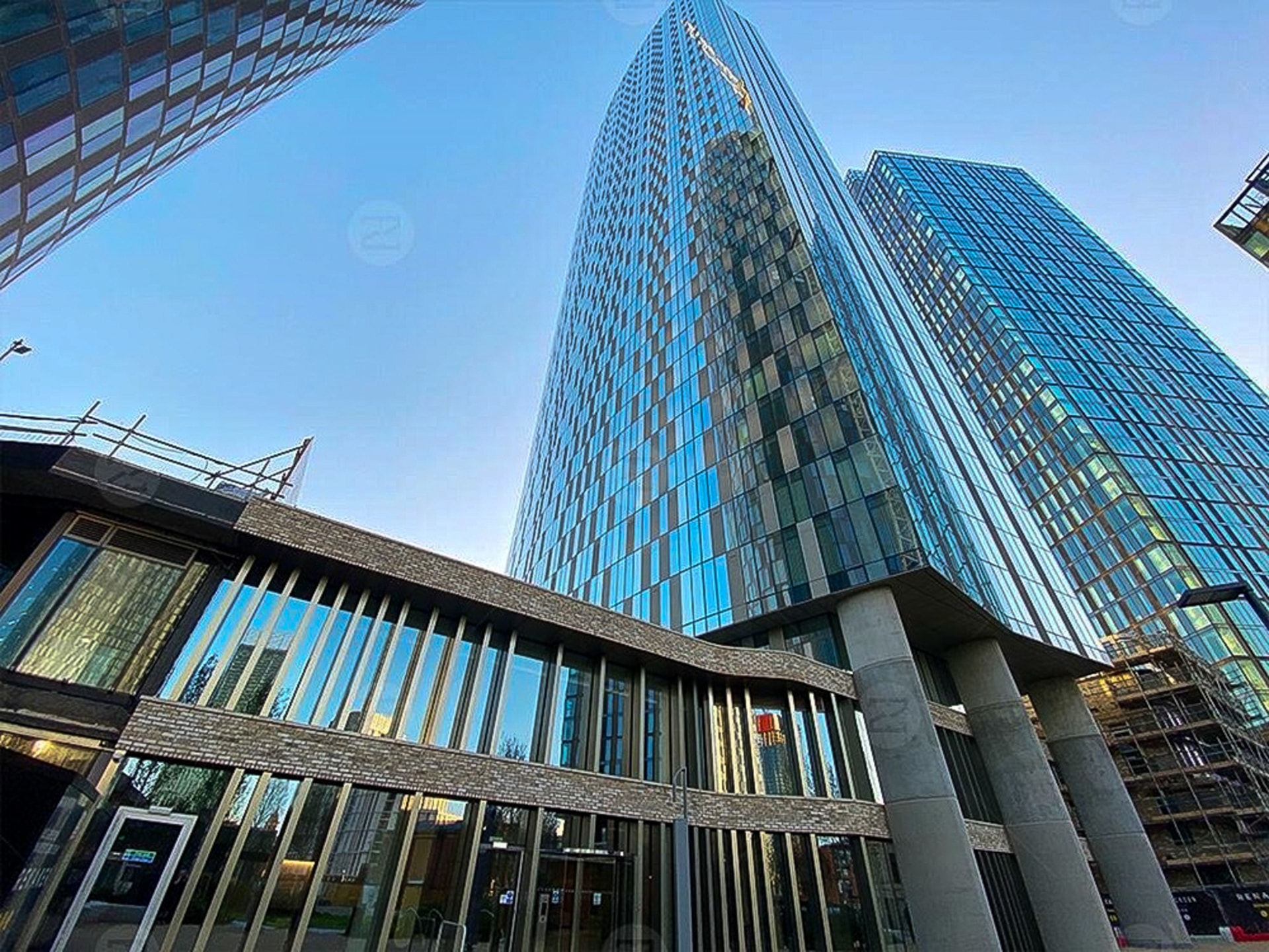 Blade Tower glass facade seen from street level